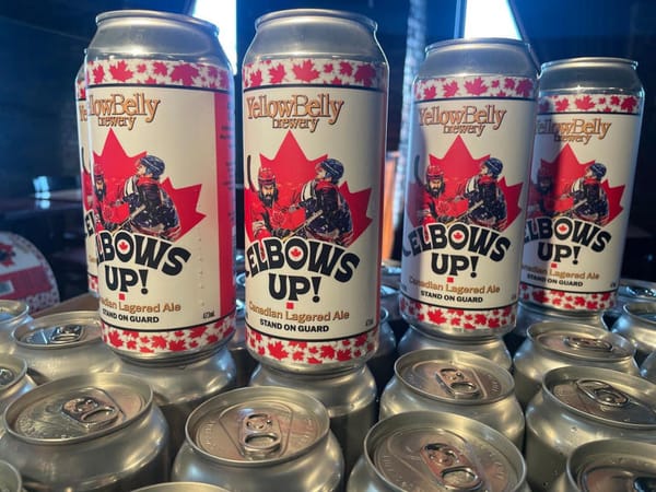 Cans of beer with the slogan "Elbows Up"